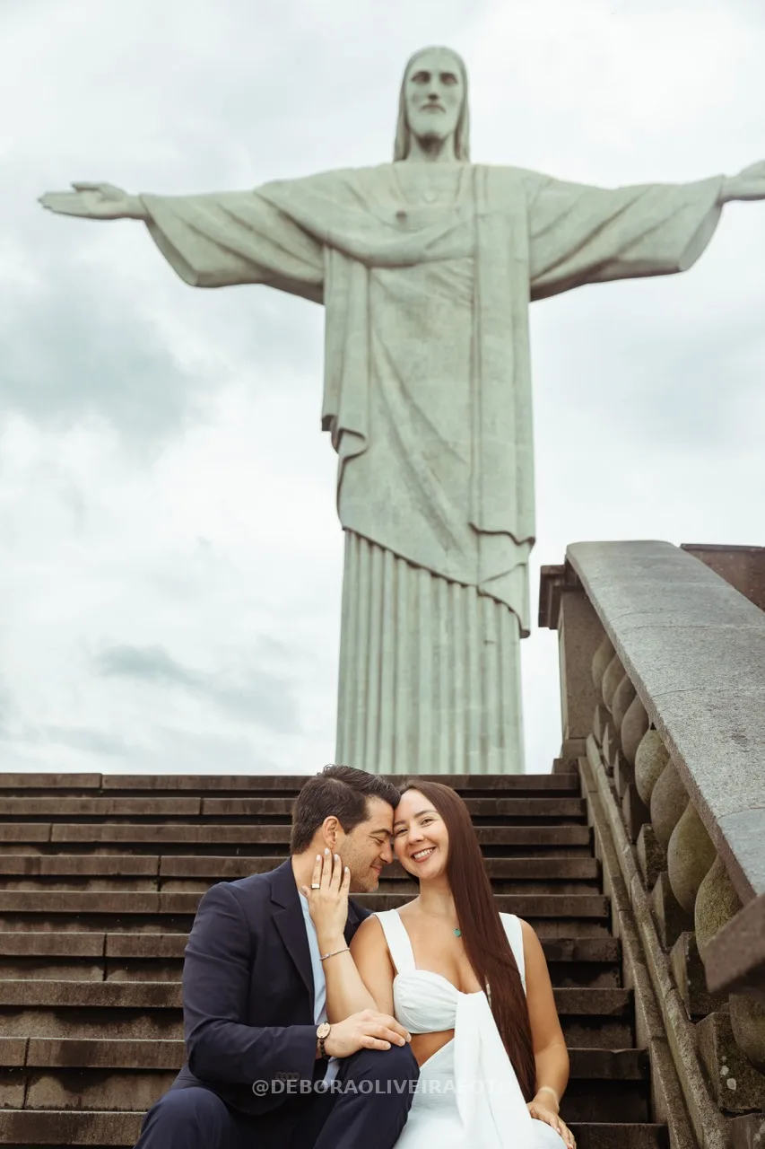 Close-up of couple sitting together on Cristo stairs – photo 11