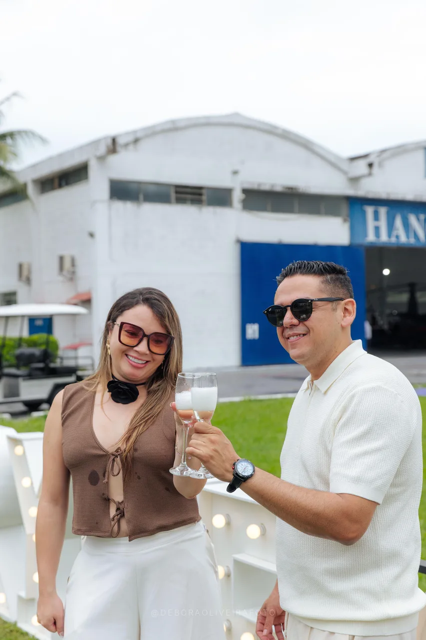 Toasting with sparkling wine after the heliport proposal in Rio de Janeiro
